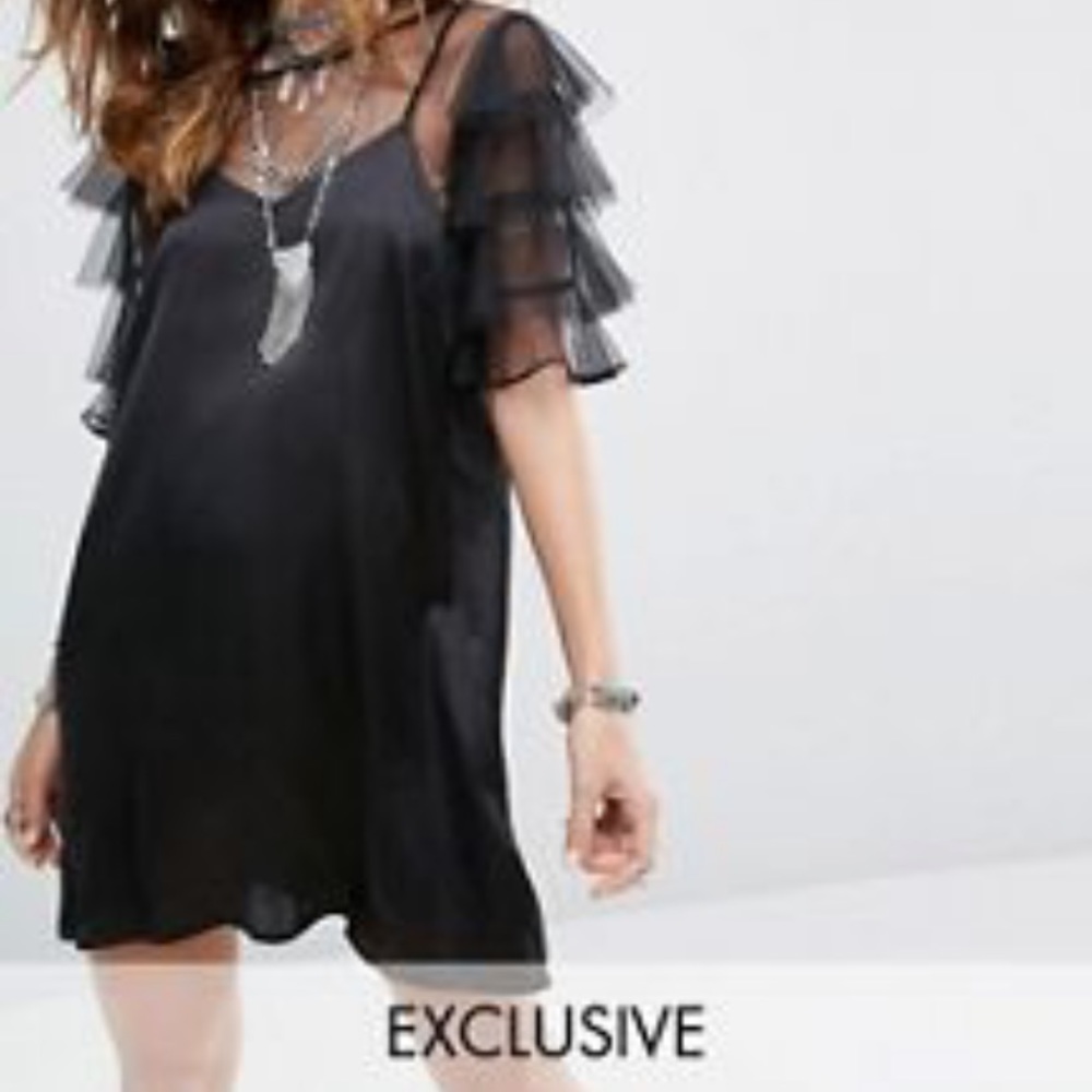 Black ruffle top with satin slip